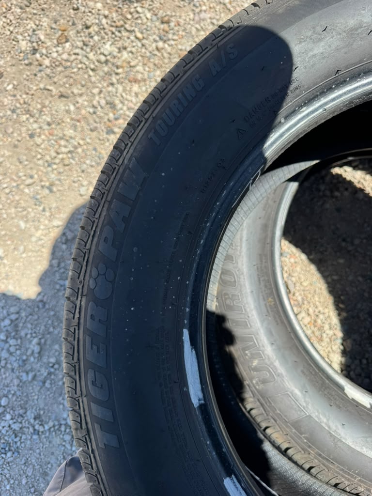 245/60R18 Pair (2 Used Tires) TigerPaw Uniroyal