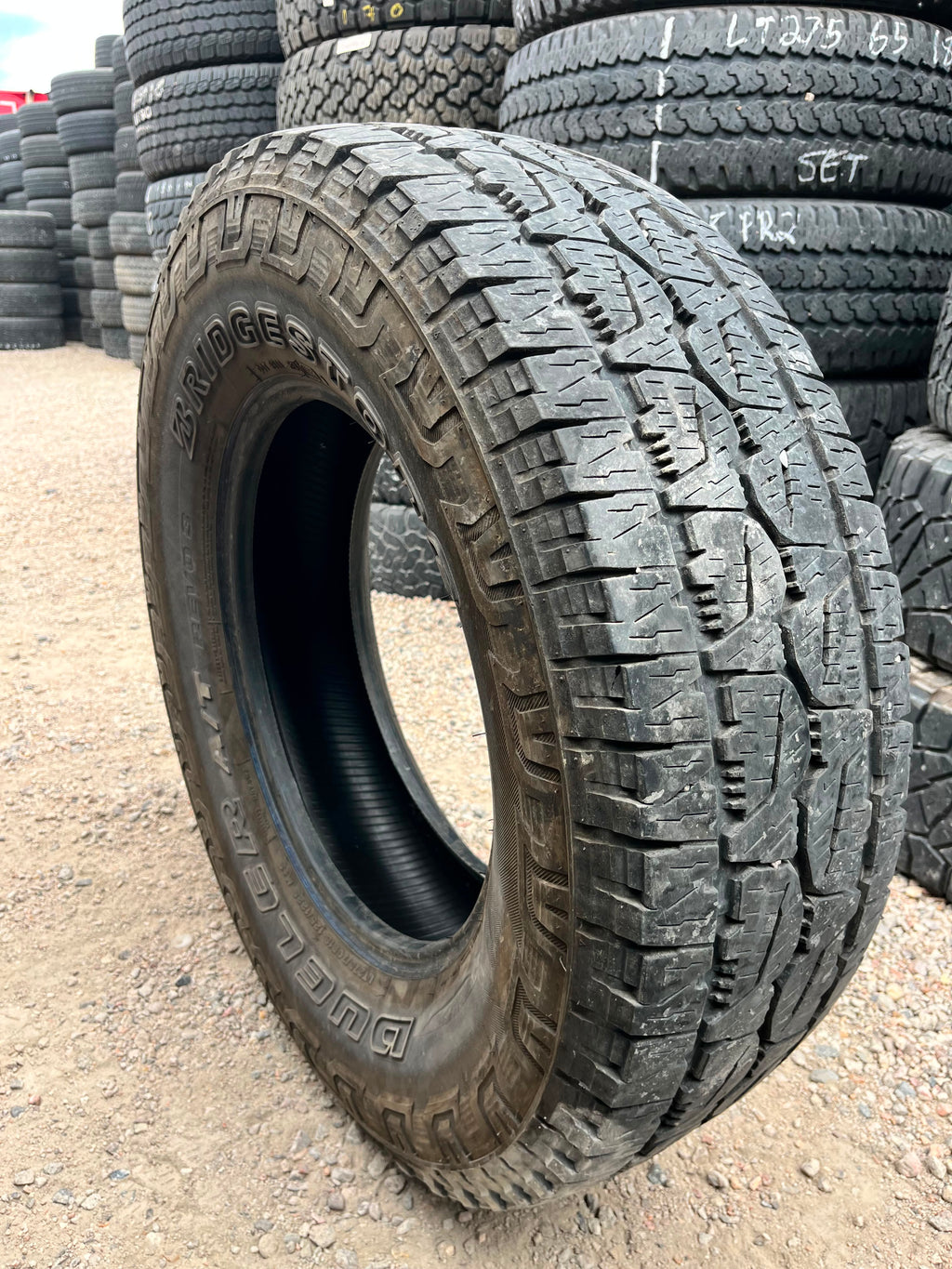 LT275/70R18 Set (4 Used Tires) Bridgestone Dueler Revo 3