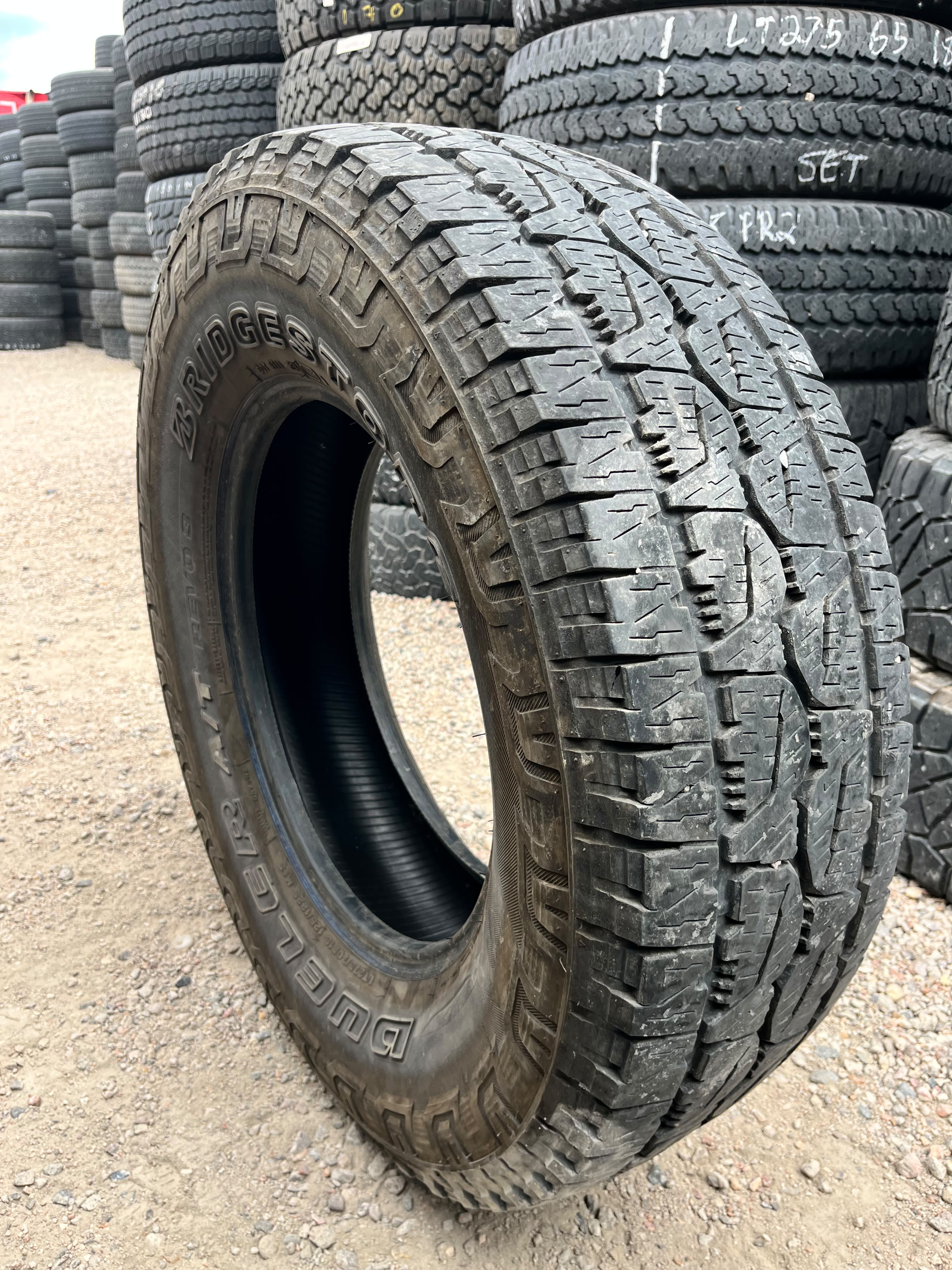 LT275/70R18 Set (4 Used Tires) Bridgestone Dueler Revo 3