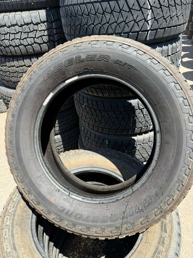LT275/65R20 Set (4 Used Tires) Bridgestone Dueler A/T